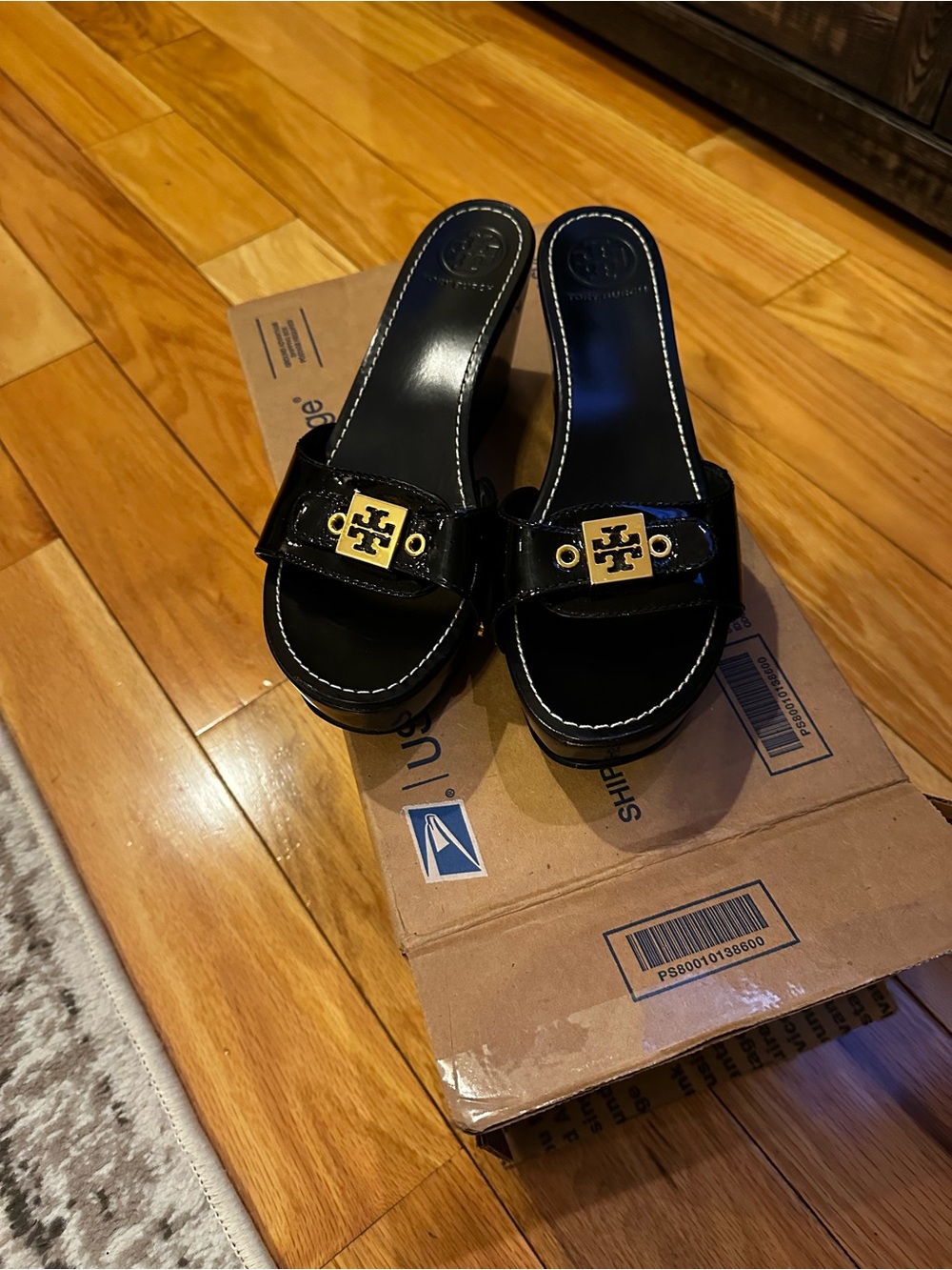 Tory Burch Black Patent Slide Mules with Gold Logo